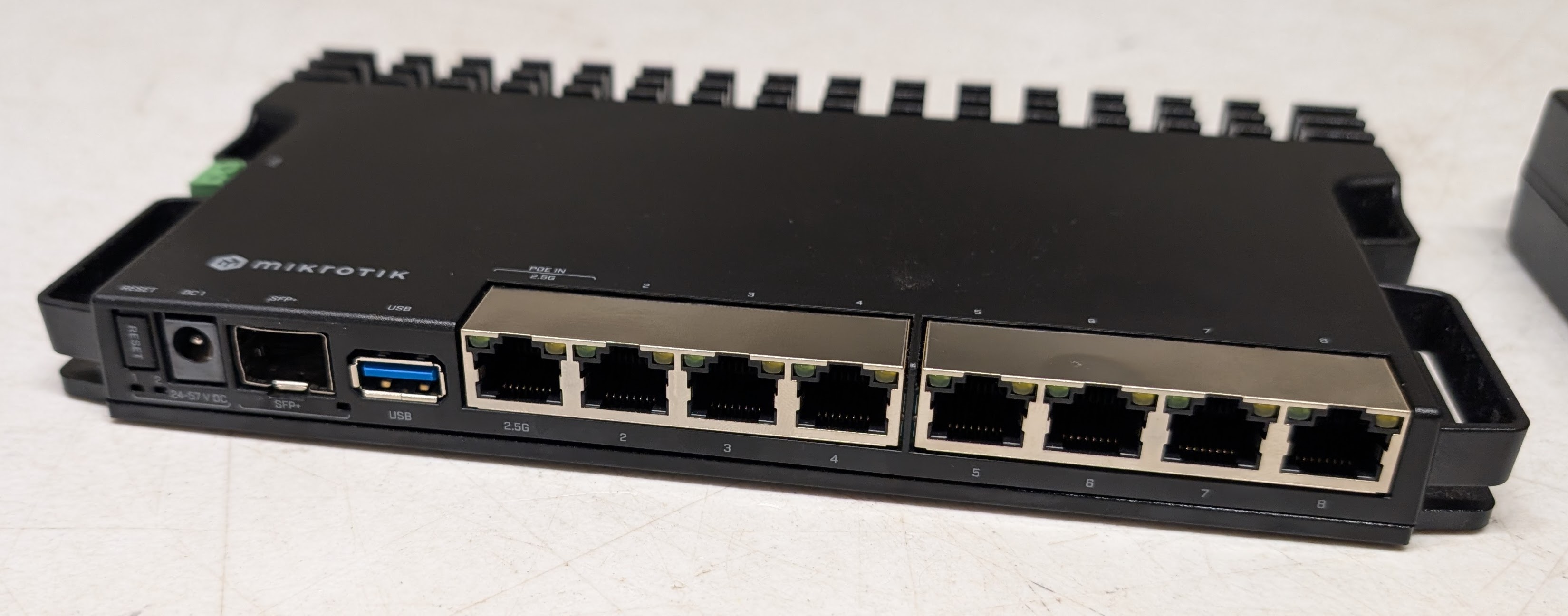 MikroTik RouterBORD 5009UG+S+ Gigabit Ethernet Router - $150